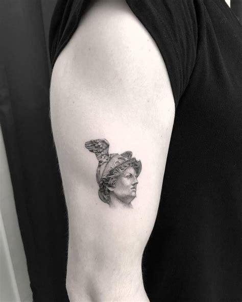 hermes statue tattoo.